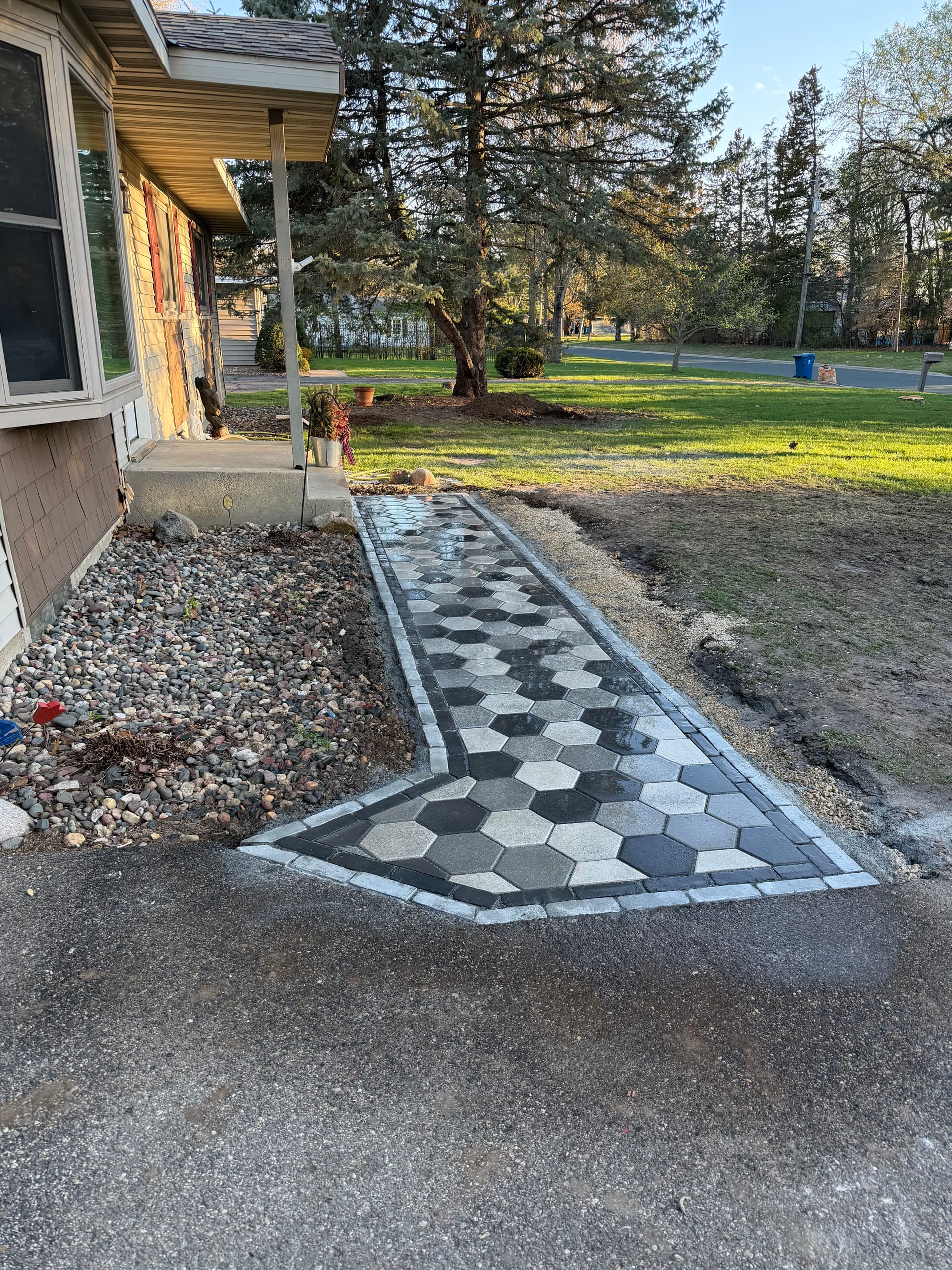 Cracked Concrete Sidewalk Replaced with Luxury Paver Walkway image