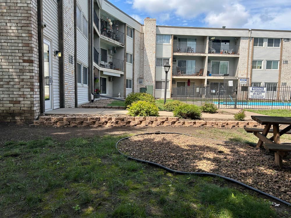 Gallery photos for Safe and Secure Retaining Walls Transform Apartment Complex in Bloomington: Image #1